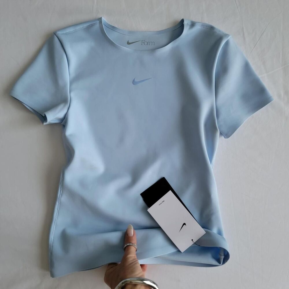 NWT NIKE FORM women's training top in baby blue, size xxs.
